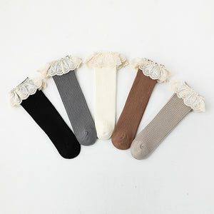 Girls socks in neutral shades. Frill detailing exclusive to Bel Bambini baby bvoutique.