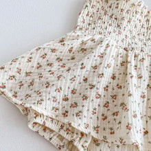 Load image into Gallery viewer, A line skirted romper suit is so cute for girls. Rose print on an ivory ground. Baby and Toddler clothing at Bel Bambini baby boutique.