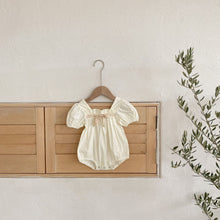 Load image into Gallery viewer, Girls square neck romper with puff sleeves and gathering making this romper perfect for those special occasions. Contrast bow detailing to the front. Baby girls clothiong and toddler girls clothing for special occasions.