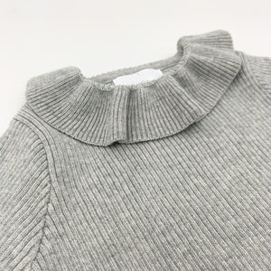 Rib knit sweater for girls with a pretty frill collar, super warm and comfortable sweater up to 3 years old. Shop girls tops at Bel Bambini baby boutique.