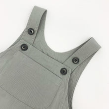 Load image into Gallery viewer, Adjustable button fastenings to the shoulder straps to allow for growth. Available in sizes 0-6., 6-9m, 9-12m, 12-18m, 18-24m. Dove grey dungarees exclusive to Bel Bambini baby boutique.