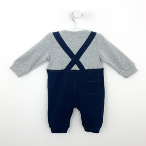 Back shot showing the criss cross style back detail and pocket on the bum. Long sleeves, soft and comfortable baby clothing for boys.