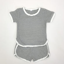 Load image into Gallery viewer, Our Boys shorts and T-shirt set in a black and white stripe. Contrast binding in white. Available in supersoft cotton, this is a perfect summer outfit for toddler boys up to 5 years old.