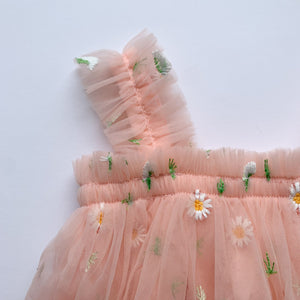 Girls party dress in sizes 12-18 months, 18-24 months, 2- 3 years. Perfect dress for special occasions. Peach dress for girls with embroidered flowers and tulle frill details.