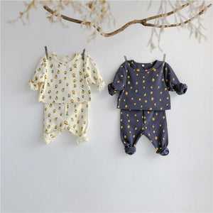 Lemon printed loungewear sets for baby boys and girls  up to 2 years. Shop our baby clothing online at Bel Bambini. Trendy and fashionable baby clothes for your little one.
