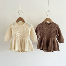 Load image into Gallery viewer, Our girls knitted romper is available in cream or mocha. Perfect essential girls outfit for the autumn winter season. Long sleeves make this warm and cosy. Shop our baby and toddler collections online at Bel Bambini baby boutique.