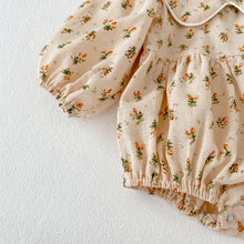 Load image into Gallery viewer, Elasticated cuffs and stylish and versatile little outfit for girls.hem. Our girls floral romper is