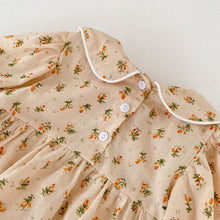 Load image into Gallery viewer, Back detail shot showing three button fastenings down the centre back. Exclusive baby and toddler clothes at Bel Bambini baby fashion boutique.