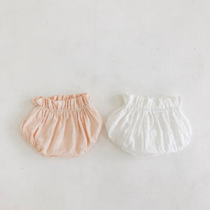 Bloomers for baby girls and bloomers for toddlers. Shop our summer bloomer sets in nude pink and white from newborn up to 2 years.