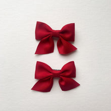 Load image into Gallery viewer, Girls red hair accessories, perfect for the festive time of year. Christmas hair bows for girls.