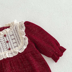 Lace Trim detail red romper suit p[erfect for christmas party oufit and christmas time. Girls christmas party outfit for toddlers and babies.
