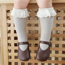Load image into Gallery viewer, Girls knee high socks with a frill trim ion beautiful neutral shades team up perfectly with any outfit.
