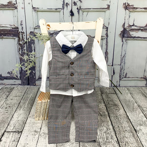 Toddler Boys stylish 4-piece outfit perfect for those special occasions, christenings, weddings and gatherings. Party outfit for boys that will sure wow the party guests. A stylish suit for little boys.