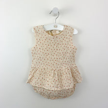 Load image into Gallery viewer, Baby girls set for up to 2 years. Our sleeveless peplum top comes complete with matching bloomers in a beautiful rose print on a soft cream ground. Textured cotton fabric for a lightweight summer fabric. Perfect baby gift. Exclusive to Bel Bambini baby boutique.