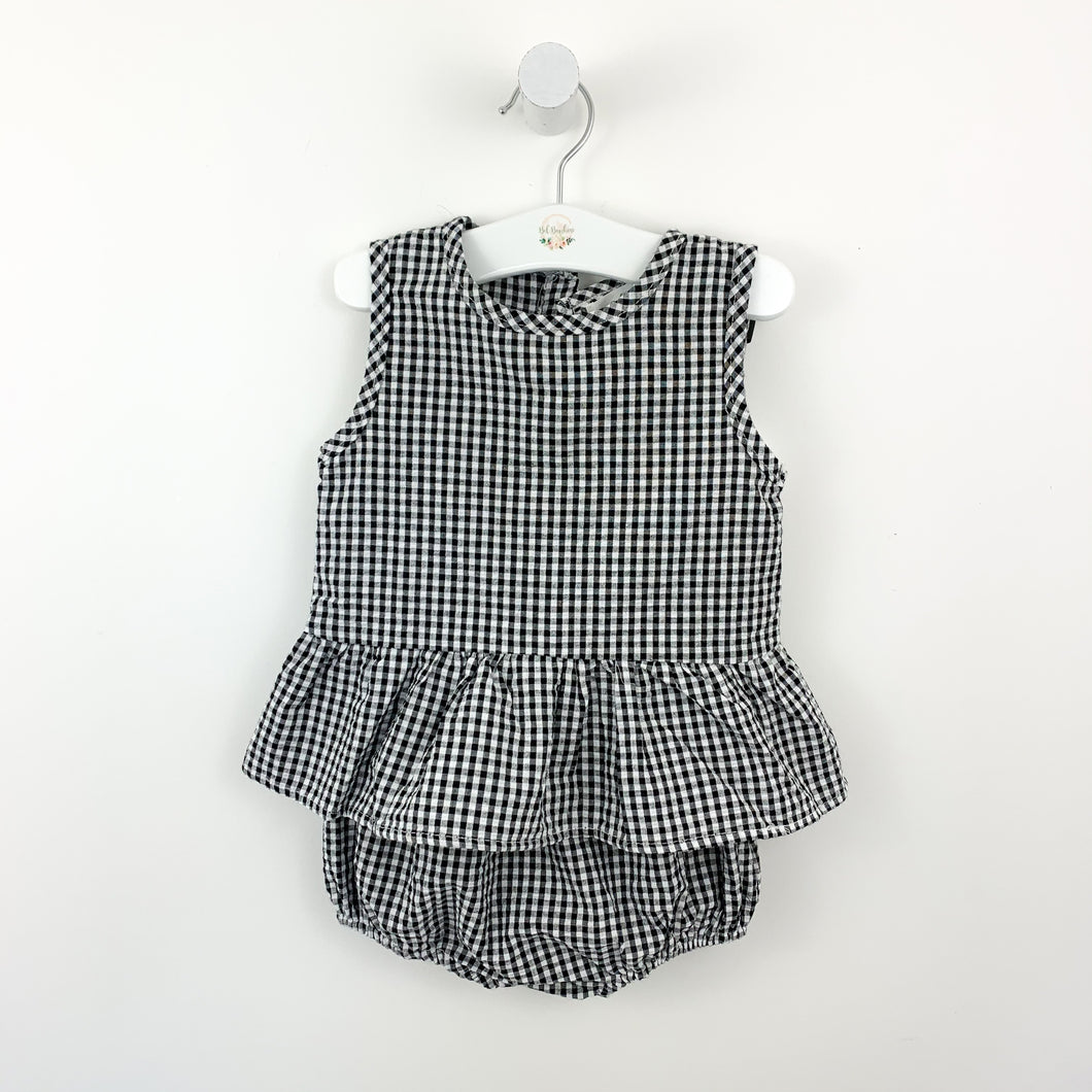 Girls peplum top and bloomers set in navy gingham print, perfect summer outfit for baby girls. Shop our exclusive collections for babies and toddlers today.