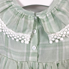 Load image into Gallery viewer, Two button fastenings doen the centre back on our girls romper dress. Summer outfits for baby and toddler girls exclusive to Bel Bambini baby boutique. Shop online today.