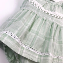 Load image into Gallery viewer, Cotton romper dress in mint green check print. Crochet detailing for girls up to 2 years.