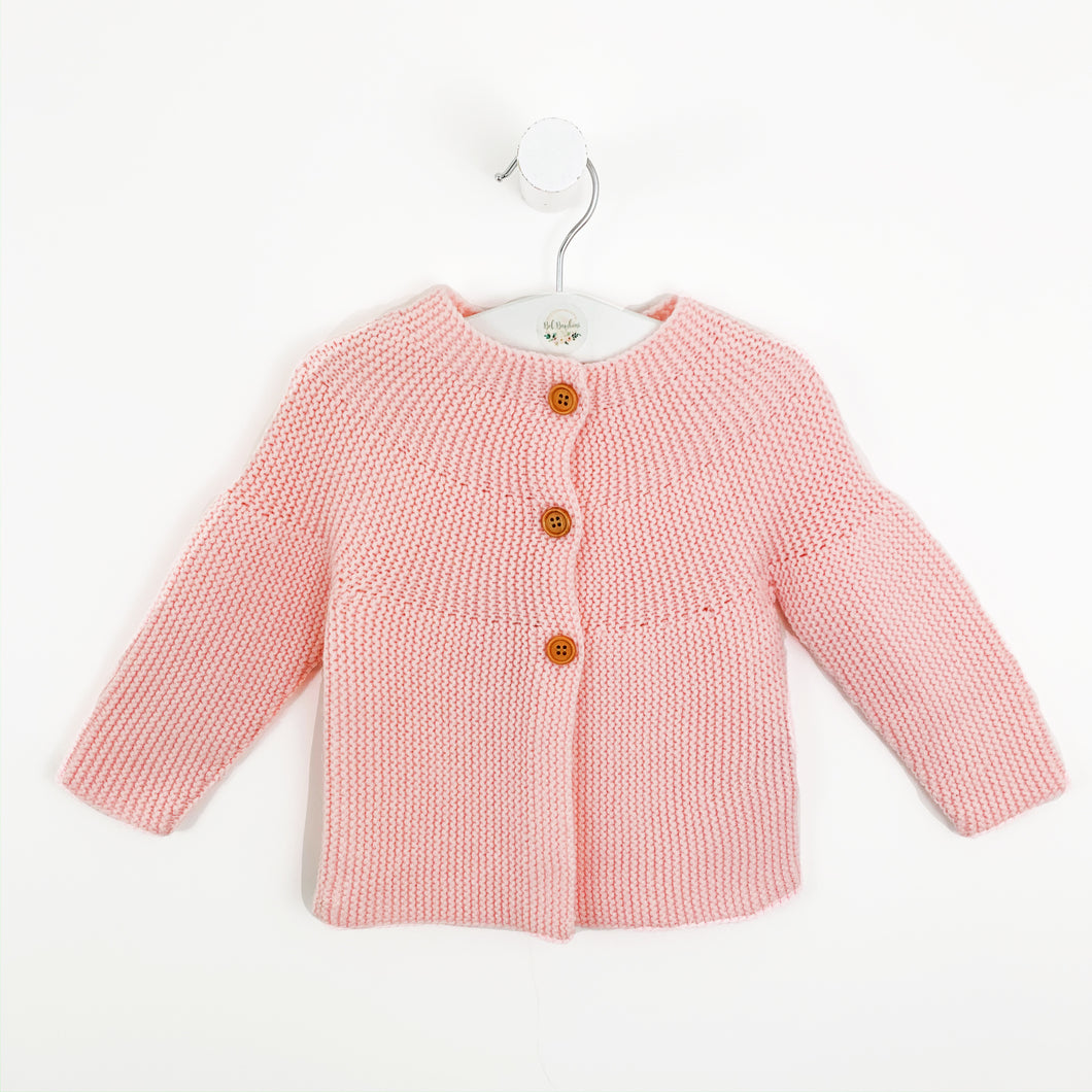Baby knitted cardigan in pink. Long sleeve baby cardigan in a beautiful candy pink shade. Toddler cardigan for all seasons to layer up those pretty outfits.