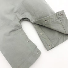 Load image into Gallery viewer, Popper fastenings allow for easy nappy changes on our boys dungarees in grey.