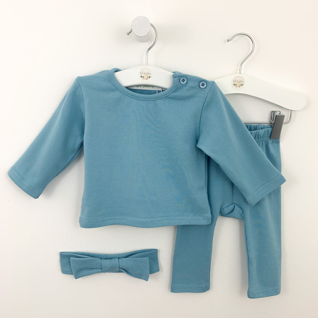 Loungewear set for baby girls available in soft blue or sugar pink. Set comes complete with a headband, long sleeve tee and leggings. Baby girls cotton rich lounge set is perfect for playing and days at nursery or chilling at home.