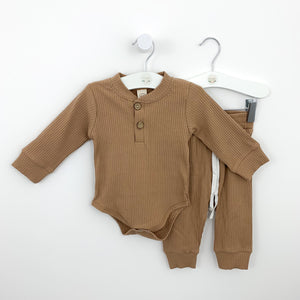 Boys lounge set in tan or grey marl. Perfect for playing and relaxing. Ribbed set with a long sleeved vest and matching pants. Baby boys and toddler boys  comfortable lounge set. Available in sizes 0-18 months for boys.