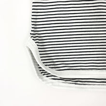 Load image into Gallery viewer, Striped tee with a stepped hem and contrast binding. A black and white summer set for toddler boys exclusive to Bel Bambini baby boutique.