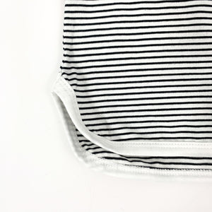 Striped tee with a stepped hem and contrast binding. A black and white summer set for toddler boys exclusive to Bel Bambini baby boutique.