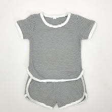 Load image into Gallery viewer, Our Boys shorts and T-shirt set in a black and white stripe. Contrast binding in white. Available in supersoft cotton, this is a perfect summer outfit for toddler boys up to 5 years old. 