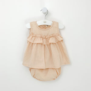 Baby girls summer outfit. A pretty top and bloomers set for girls in nude pink. Ruffles and frills make this a stylish summer set. sizes 0-2 years. Sleeveless top and ruffle bloomers for baby girls.