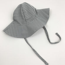 Load image into Gallery viewer, Baby boys summer hat in grey and white with two side straps for easy fastening under the chin if its breezy. Perfect baby boys outfit  at Bel Bambini baby boutique.