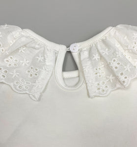 Long sleeved super soft blouse, sleeve cuffs have a flutter edge finish. A beautiful broderie anglaise lace trim to the neckling make this top so pretty and perfect to layer underneath dresses and rompers or wear with leggings, skirt or bottoms. Such a versatile top that can be dressed up or down.