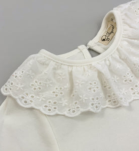 Long sleeved super soft blouse, sleeve cuffs have a flutter edge finish. A beautiful broderie anglaise lace trim to the neckling make this top so pretty and perfect to layer underneath dresses and rompers or wear with leggings, skirt or bottoms. Such a versatile top that can be dressed up or down.