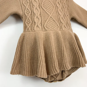 Mocha knitted romper for baby girls and toddler girls. Stylish autumn winter pieces that are exclusive to Bel Bambini baby and toddler clothing boutique. Shop our collections and enjoy free shipping on orders over £80