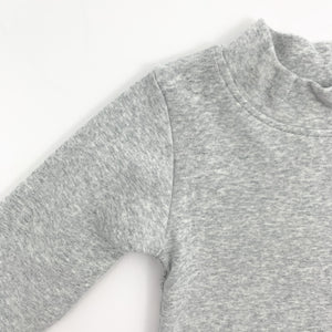 Grey marl sweater for baby boys with a high neck and long sleeves. 0-24 months clothing for boys at Bel Bambini boutique.