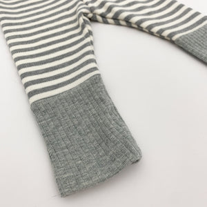 Detail shot showing the contrast grey rib cuff to the bottom of out comfortable baby boys striped leggings in grey. Available in 0-2 years at Bel Bambini Baby Boutique. Shop our collections for baby boys 0-2 years online.