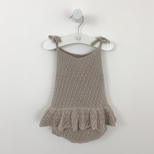 Load image into Gallery viewer, Delicate knitted infant romper. Beatifully stitched with a scallop frill to the waist. Preety knitted romper for girls available in taupe and mauve/ pink. 0-2 years.