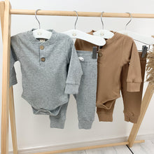Load image into Gallery viewer, Our loungewear sets are so comfortable for boys 0-2 years old. Long sleeves and super cute. Grey marl lounge set or tan lounge sets are available at Bel Bambini baby clothing boutique.