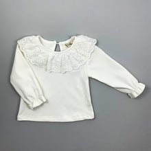 Load image into Gallery viewer, Toddler Long sleeved super soft blouse, sleeve cuffs have a flutter edge finish. A beautiful broderie anglaise lace trim to the neckling make this top so pretty and perfect to layer underneath dresses and rompers or wear with leggings, skirt or bottoms. Such a versatile top that can be dressed up or down.