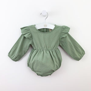 Baby girl romper. Flutter details to the shoulder and long sleeves make this baby girls romper so pretty. Toddlers are so stylish at Bel Bambini.