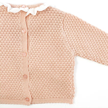 Load image into Gallery viewer, Detail shot of our Bel Bambini two piece knitted set in shell pink. Stunning girls knitted outfit. button fastenings doen tge centre back and a frill collar, such a beautiful baby set. 0-24 months baby clothing and toddler styles.