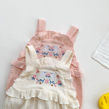 Load image into Gallery viewer, Available in cream or pink our embroidered romper for girls has pretty frill trims for the sweetest summer outfit.