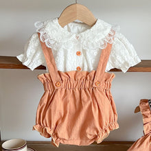 Load image into Gallery viewer, Baby girls lace blouse in ivory with a pretty peter pan collar. Burnt orange bloomer dungarees to complete  the look of this beautiful set. Stylish baby clothes at Bel Bambini baby boutique. Shop baby clothes 0-24 months online.